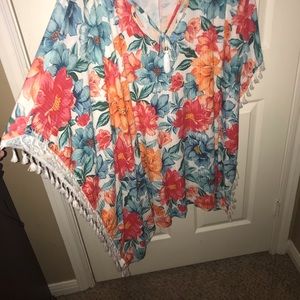 •Flowered swimsuit cover•